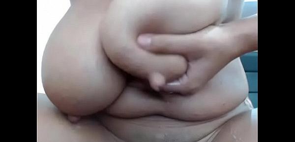  Milf grabs her huge boobs with breast milk